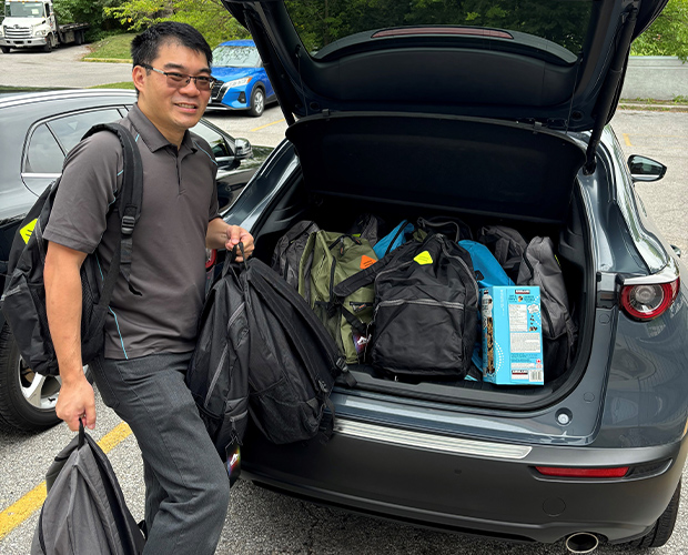 Employee at backpack drive 