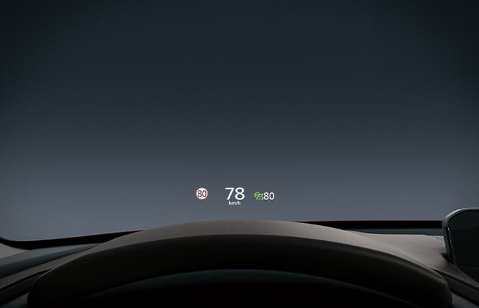 Close-up of windshield-projected Active Driving Display showing 80 km speed limit, 78 km actual speed.