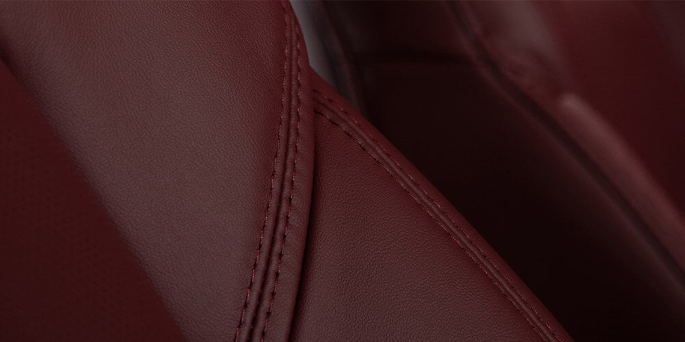 Detail of Garnet Red leather-trimmed seat