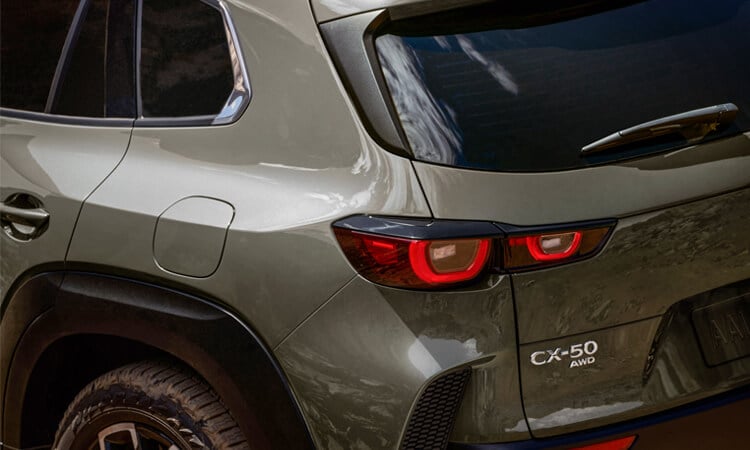 Close up of CX-50 AWD nameplate. 