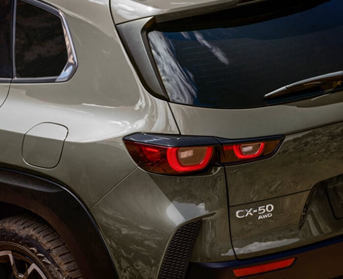 Close up of CX-50 AWD nameplate. 