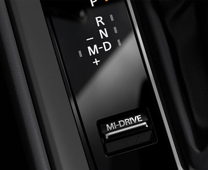 Close up of Mi-Drive toggle, shifter, multifunction HMI Commander control dial on CX-50 centre console. 